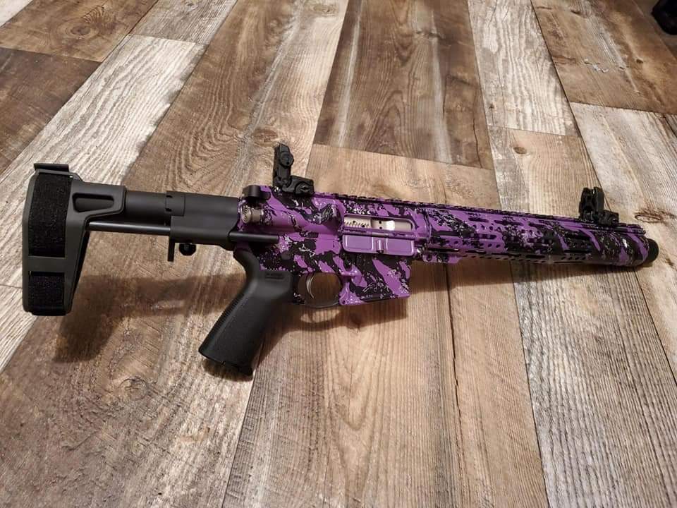Custom purple and black finished firearm component
